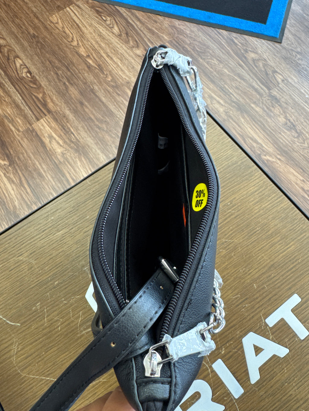Black leather purse with silver chain